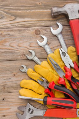 mechanical kit in wooden background. construction tool