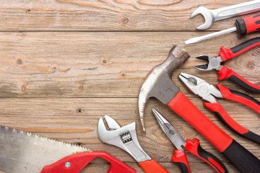 mechanical kit in wooden background. construction tool