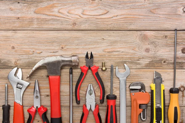 Mechanical kit in wooden background. construction tool — 图库照片