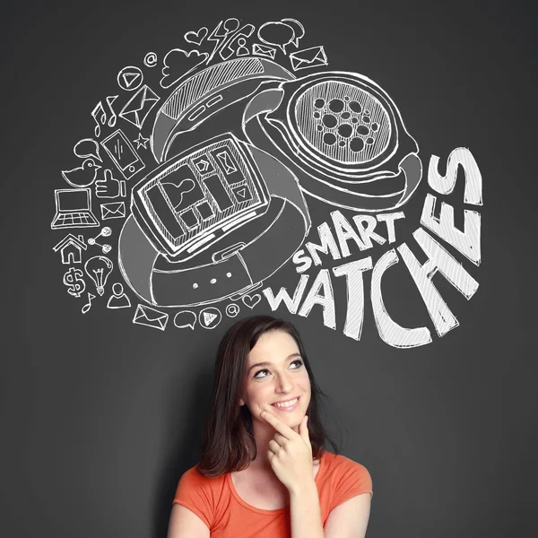 Mulher pensando em ter um smartwatch — Fotografia de Stock