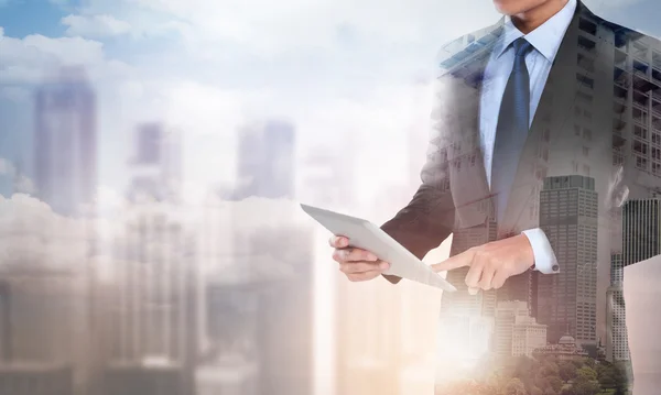 Double exposure businessman working with new modern computer tab — 스톡 사진