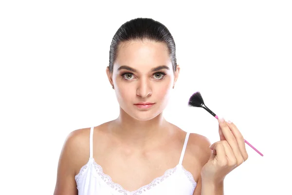 Beautiful caucasian model holding fan brush — Stock Photo, Image