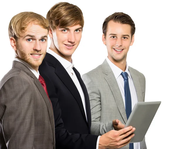 Three co-workers meeting and looking at camera — Stock Photo, Image