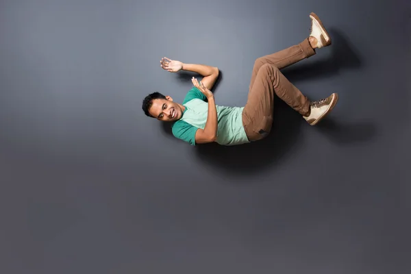 Young man fell from the top — Stock Photo, Image