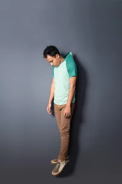 Young man floating with his hanged shirt — Stock Photo, Image