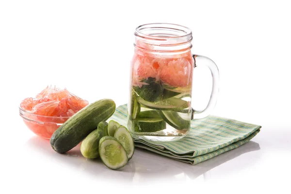 Infused fresh fruit water grapefruit and cucumber. isolated over — 图库照片