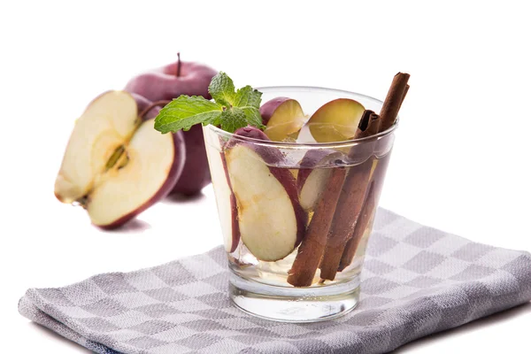 Infused fresh fruit water of apple and cinnamon. isolated over w — Stock Photo, Image