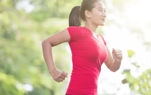 Young asian woman jogging at the park — Stock Photo, Image