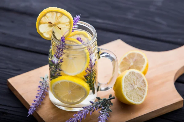 A glass infused water of lemon and lavender