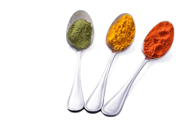 Some of indian spices on spoons — Stock Photo, Image