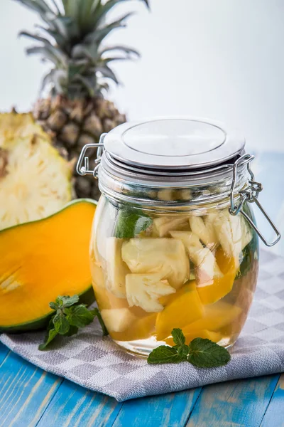 Infused water mix of pineapple, mango and mint leaf — Stock Photo, Image