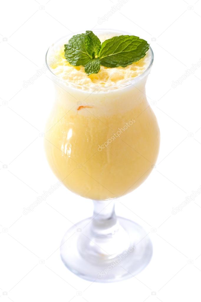 a glass of indian mango lassi