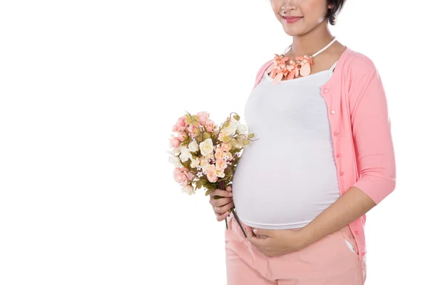 Hermosa mujer embarazada asiática sosteniendo un ramo de flores — Foto de Stock