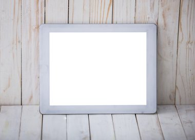 Tablet PC duvar ve ahşap arka plan, alay kadar