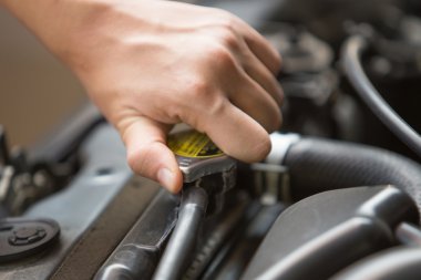 radiator pressure cap of car's engine clipart