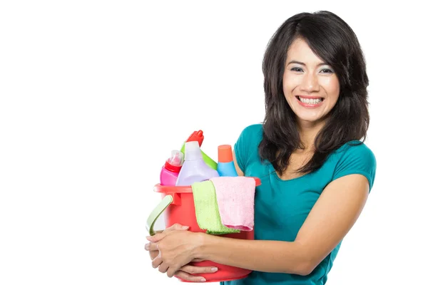 Woman holding cleaning products — Stock Photo, Image
