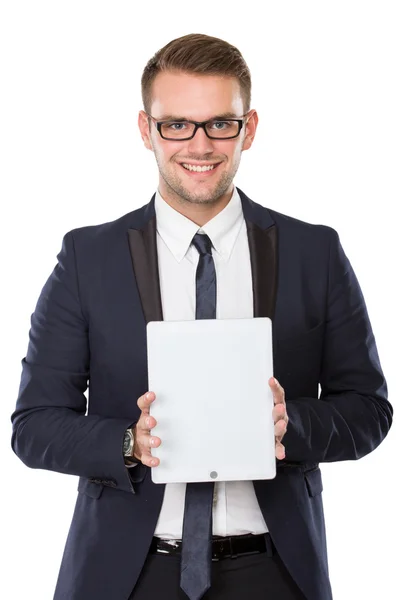 Businessman presenting a tablet pc, smiling — Stock Photo, Image