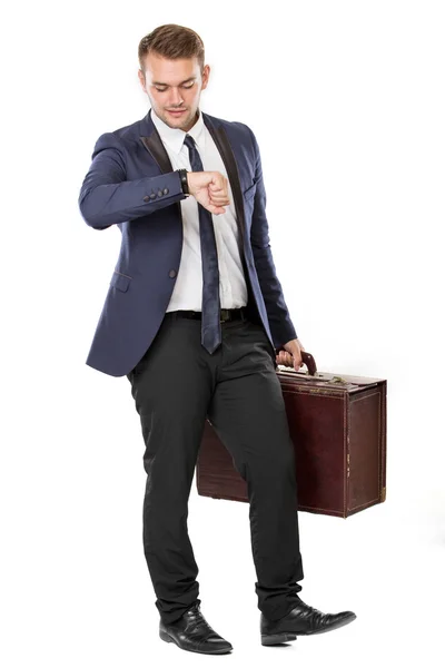 Affärsman hålla en resväska, isolerade — Stockfoto
