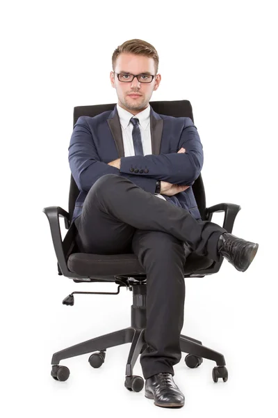 Affärsman som sitter på en stol — Stockfoto