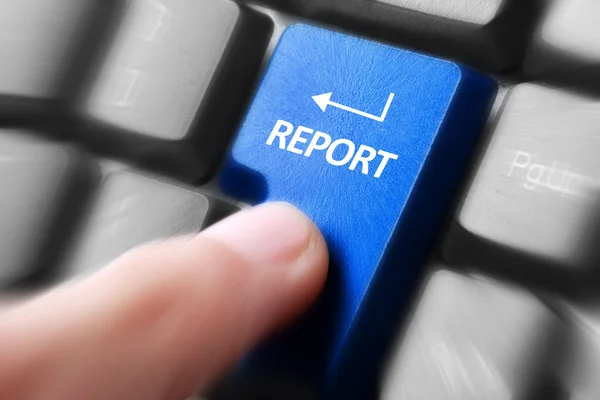 Hand press report button on keyboard — Stock Photo, Image