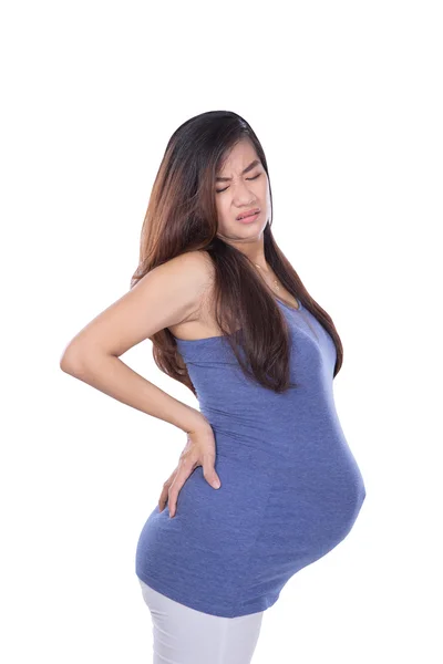 그녀의 손으로 그녀의 뒤에 임신한 여자 — 스톡 사진