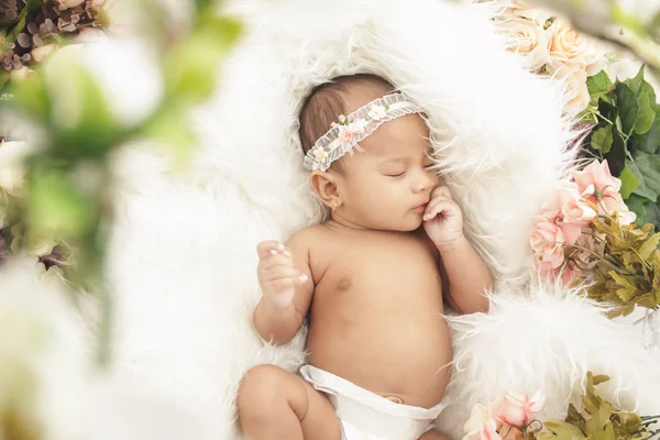 Little baby girl sleeping comfy on fur blanket — Stock Photo, Image