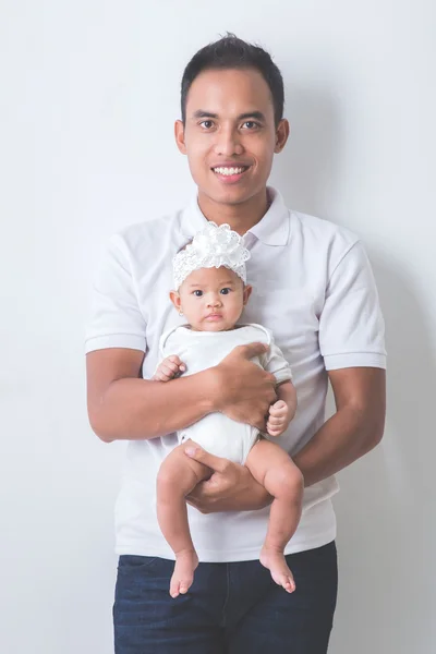 Asian father holding his adorable baby — Stock Photo, Image