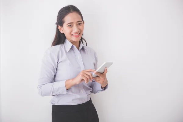 Asian Young secretary witha cellphone — Stock Photo, Image