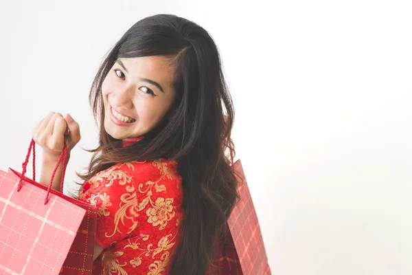 Happy asian woman shopping on chinese new year celebration — Stock Photo, Image