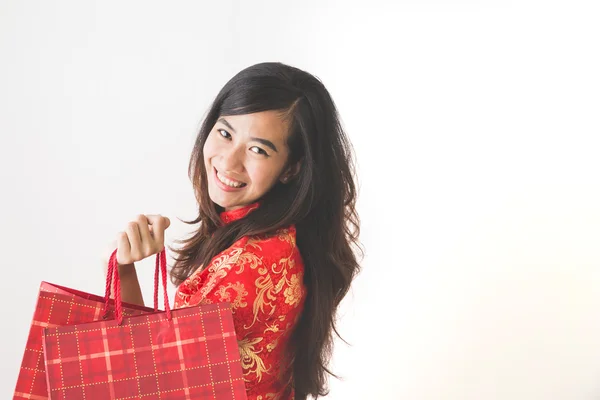 Happy asian woman shopping on chinese new year celebration — Stock Photo, Image
