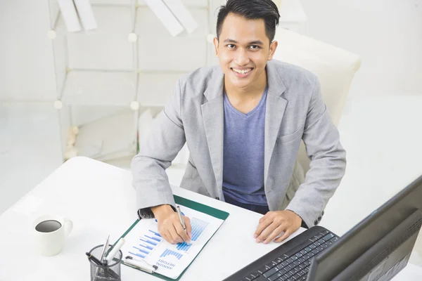 Young business owner in office — Stock Photo, Image