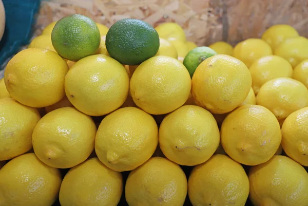 Limes and Yellow lemons background and pattern