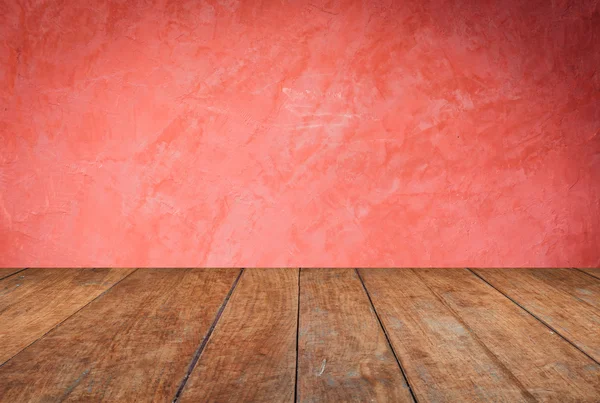 Perspective brown wood on red wall background — Stock Photo, Image