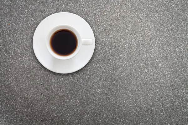 Cerrar taza de café blanco en la textura brillo — Foto de Stock