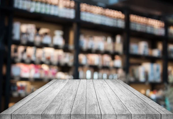 Preto e branco mesa de madeira com fundo café borrado — Fotografia de Stock