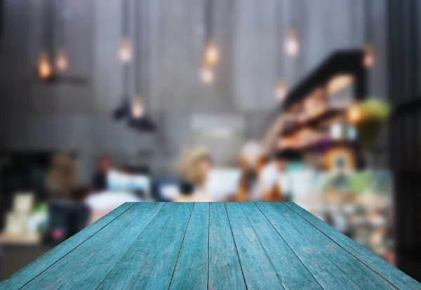 Perspektive blaues Holz mit verschwommenem Hintergrund im Café — Stockfoto