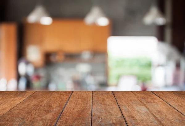 Tischplatte mit abstraktem, unscharfem Café-Hintergrund — Stockfoto