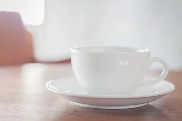 White coffee cup in coffee shop — Stock Photo, Image