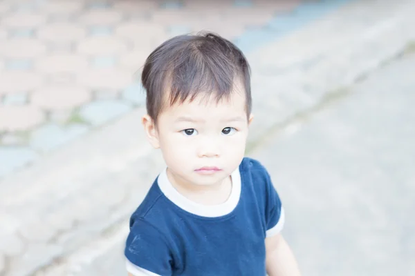 Little asian boy looking at camera — Stock Photo, Image