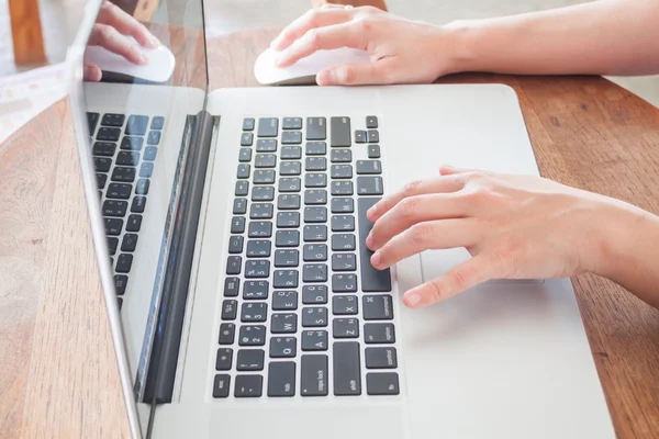 Close up of woman using notebook — Stock Photo, Image