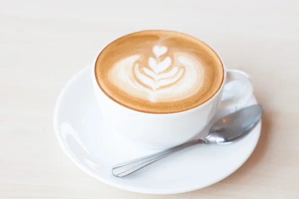 Coffee cup with latte art — Stock Photo, Image