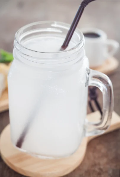 Glass of fresh coconut water — Stock Photo, Image