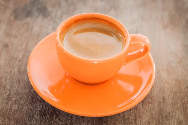 Hot coffee on wooden table — Stock Photo, Image