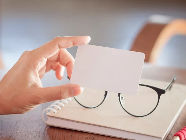 Woman hold blank business cards — Stock Photo, Image