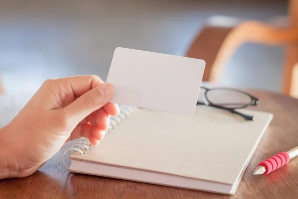 Woman hold blank business cards — Stock Photo, Image