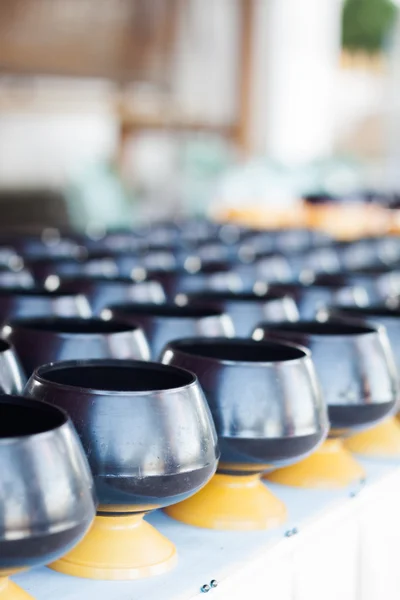 Monk's alms-bowl in temple — Stock Photo, Image