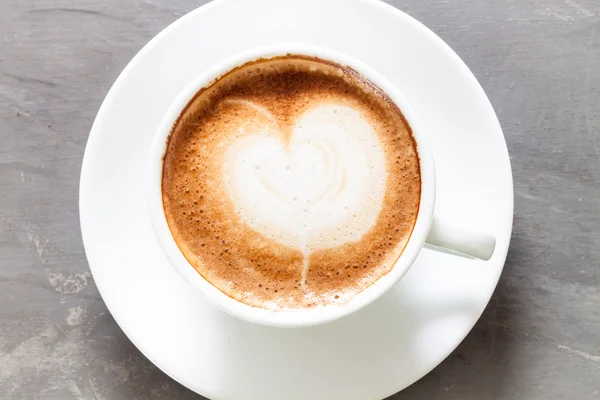 Coffee cup on grey background — Stock Photo, Image