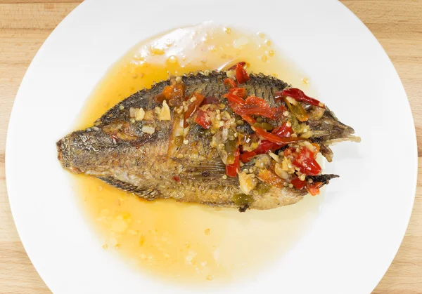 Fried fish with chili sauce — Stock Photo, Image