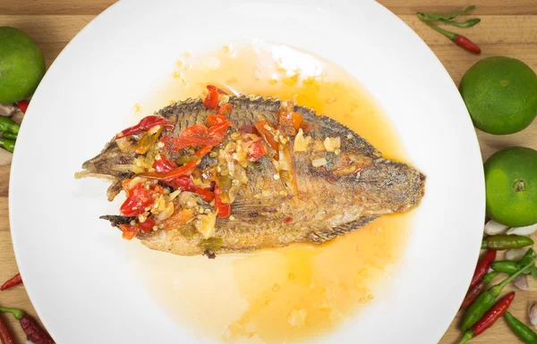 Fried fish with chili sauce — Stock Photo, Image