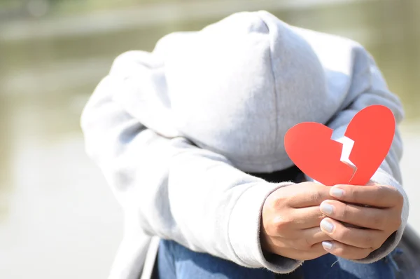 Female Offering Broken Heart in Hands — Stock Photo, Image